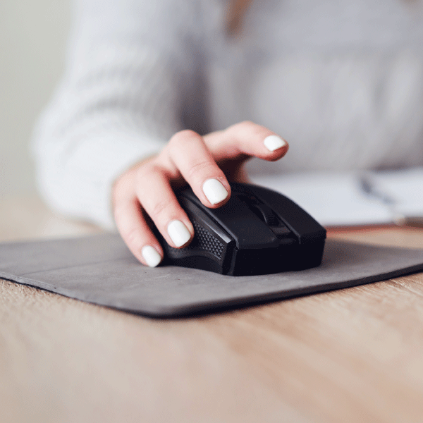 woman holding a computer mouse